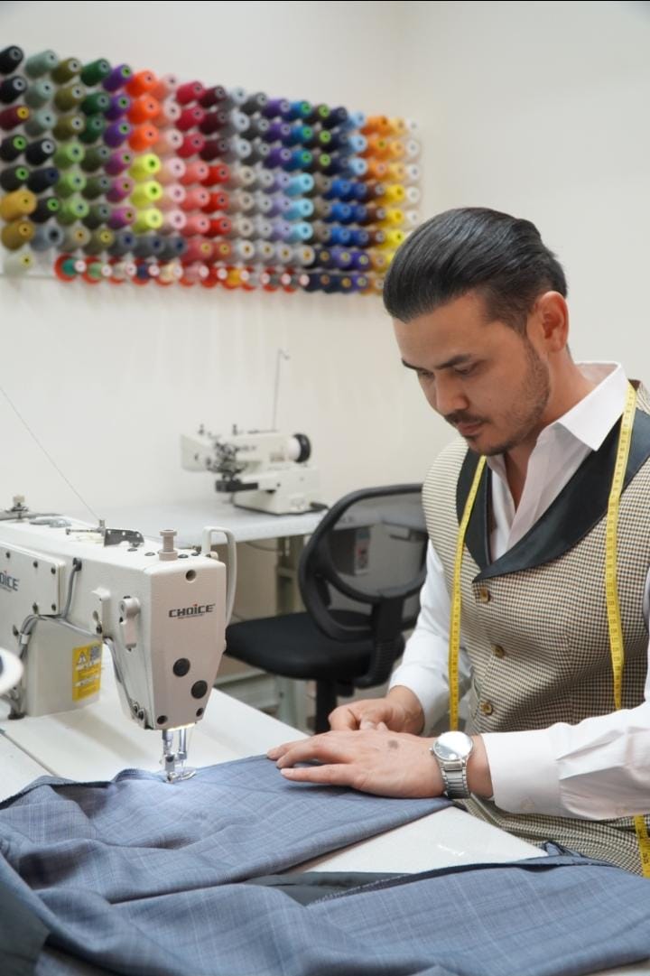 Tailor doing alterations